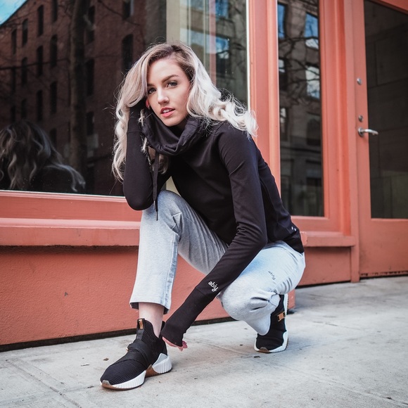 puma defy black and gold